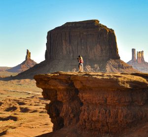 A couple standing together at John Ford Point in Monument Valley Navajo Tribal Park in Arizona